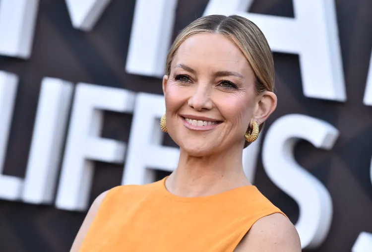 Kate Hudson Turned Heads in a Saffron Dress With Deep Side Cutouts a Surprising Back Detail